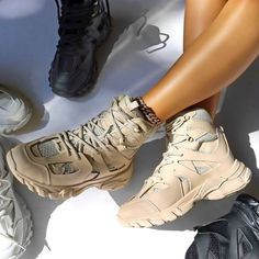 Elevate Your Style In These Low-Key But Fly Chunky High Top Sneakers Featuring Smooth Vegan Leather In A Cool Neutral Palette. Lace Up Closure. Fits True To Size On Most. Available In : Nude, White. Women Shoes Online, Neutral Palette, Wedge Sneaker, Low Key, Beige Color, Shoes Online, High Top, Women's Shoes, Top Sneakers