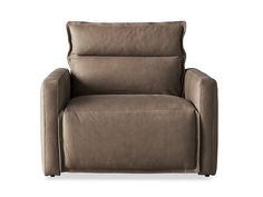 the reclining chair is shown in grey sued with an armrest and foot rest