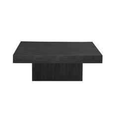 a black square table sitting on top of a white floor