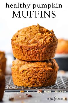 healthy pumpkin muffins stacked on top of each other with the title overlay