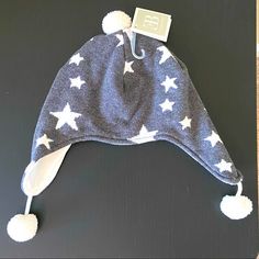 Nwt Winter Hat Size 0-12 Months From Elegant Baby (Sold At Bloomingdales). Grey With Stars Knit Outside And White Plush Inside. White Pom Poms On The Top And Ear Flaps. Black Panther Hat, Alice In Wonderland Hat, Short Brim Hat, Knitted Owl, Kids Bucket Hat, Girl Shadow, Baby Beanie Hats, Navy Hats, Toddler Winter