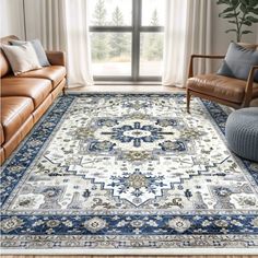 a living room with couches, chairs and rugs on the floor in front of a window