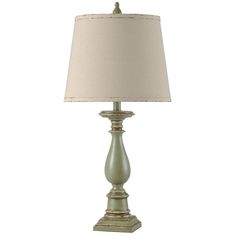 a table lamp with a white shade on it's base and a beige lampshade