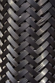 a close up view of a woven material with lines in the center and diagonals on it