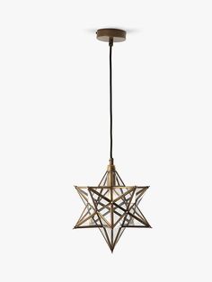 a star shaped light hanging from the ceiling