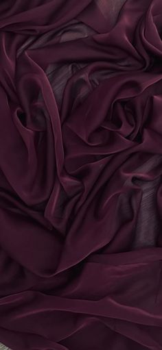 the fabric is very dark purple in color