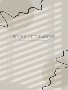 the end - of - the - year workbook is shown with shadows on it