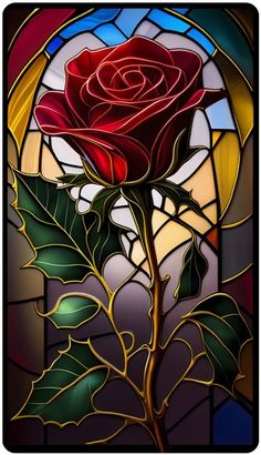 a stained glass window with a rose in it