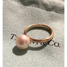 This Stunning Tiffany & Co. Ring Features A Beautiful White Pearl Set In 18k Rose Gold Details: * Size 4 For Pinky * It Comes With Tiffany & Co. Pouch * 18k Gold 750 * Condition - Excellent Condition, Shows Very Minimal Signs Of Wear. No Damages On The Stone * Hallmarked: Tiffany &Co.750 Special Notes: * Photos Have Been Enlarged To Provide Best Details. * Condition Rating Is Subjective And We Have Accessed This Item To The Best Of Our Ability. * Collectible - Will Make A Perfect Gift Or A Great Pearl Ring Tiffany & Co., Pearl Set, Knot Necklace, Pinky Ring, White Pearl, Gold Details, Womens Jewelry Rings, 18k Rose Gold, Tiffany & Co.