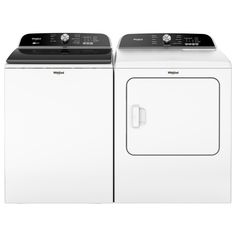 a white washer and dryer sitting side by side on top of each other