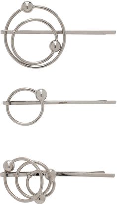 Set of three hair pins in silver-tone brass. · O-ring at face · H1.25 x W2; 0.75 x W3; x H0.75 x W2 Supplier color: Silver Studio Jewelry, Hair Rings, Paul Gaultier, Hair Pin, Headband Hairstyles, Jean Paul Gaultier, Jean Paul, O Ring, Hair Pins