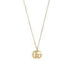 A small gold pendant necklace is a wardrobe essential for women. For your consideration: this 18K yellow gold piece with double G motif from Gucci's GG Running collection. Dress the simple and understated piece up or dress it down; the versatile pendant necklace offers a variety of options. Gucci Gold Jewelry, Gucci Necklace Gold, Small Gold Pendant, Designer Wishlist, G Necklace, Gucci Necklace, Charm Necklace Diy, Gold Keychain, Body Decor