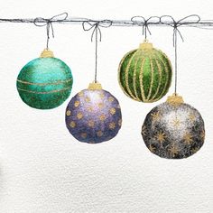 three christmas ornaments hanging from a wire on a white background with watercolor paint and gold dots