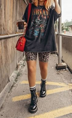 Outfit idea Edgy Day Outfit, Tshirt Dress Streetwear, 90s Mom Astethic, Punk Over 40 For Women, Black Shorts Concert Outfit, Summer Outfits In Hot Weather, Summer Edge Outfits, Western Lace Dresses For Women, Rainy Bbq Outfit