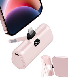 an apple watch and charging station with the iphone 11