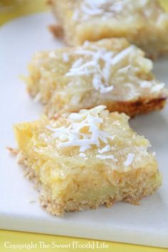 two pieces of cake sitting on top of a white plate