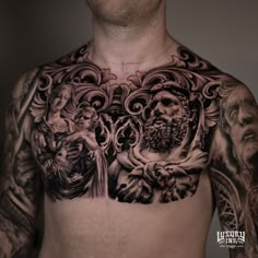 a man with many tattoos on his chest