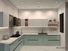 a modern kitchen with marble counter tops and white walls, along with recessed lighting