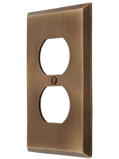 a light switch cover with two holes