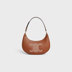 AVA BAG IN SMOOTH CALFSKIN WITH TRIOMPHE EMBROIDERY - TAN | CELINE Celine Ava Triomphe, Ava Triomphe Bag, Celine Ava Bag, Celine Ava, Triomphe Bag, Luxury Stuff, Fragrance Bottle, Direct Lighting, Pretty Bags