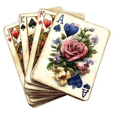 four playing cards with flowers and hearts on the front one is blue, the other has pink roses