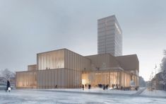 people are walking around in the snow near a building with two towers on each side