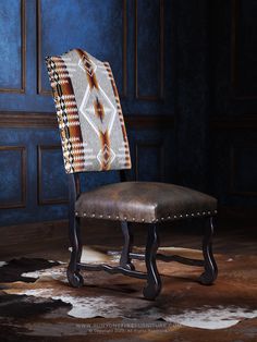 a chair with a patterned seat cover on it