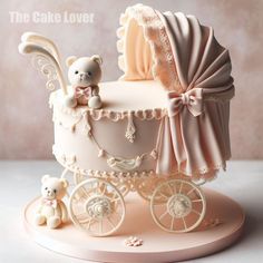 there is a cake that looks like a baby carriage with a teddy bear on it