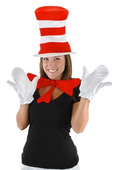 a woman wearing a cat in the hat costume and holding her hands up with both hands