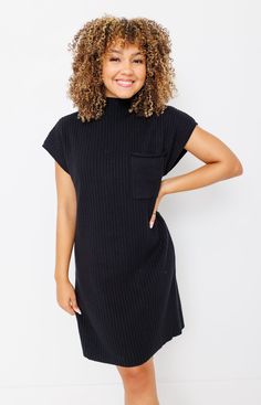 Embrace cozy elegance with the Fallon Sweater Dress in black. This sweater dress combines soft, stretchy knit fabric with a flattering silhouette that skims the body for a streamlined look. Featuring a ribbed texture and a cinched waist, it offers both comfort and style. Perfect for layering with boots and a statement belt, or dressing up with heels and accessories for a chic, polished appearance. Ideal for crisp fall days or casual winter outings, the Fallon Sweater Dress is a versatile additio Sweater Dress Black, Mock Neck Sweater Dress, Statement Belt, Casual Date Night, Fall Days, Sweater Collection, Blazer With Jeans, Ribbed Texture, Sweater Sale