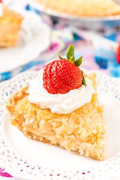 a slice of easy coconut custard pie on a white plate with strawberries