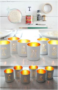 there are many cups that have the letters on them in gold and silver, along with other items