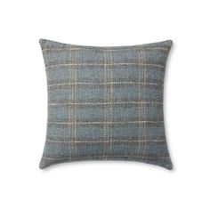 a blue and grey plaid pillow on a white background