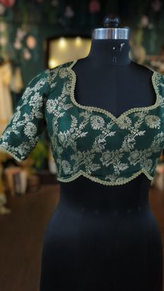 Beautiful and stylish blouse in brocade with floral design.  This blouse can be done with or without the bust cup inserts . The blouse is fully lined is cotton. Latest Blouse Neck Designs, Brocade Blouse Designs, Blouse Lehenga, Embroidery Blouses, Latest Blouse Designs Pattern, Sari Design, Latest Model Blouse Designs, New Saree Blouse Designs, Traditional Blouse Designs