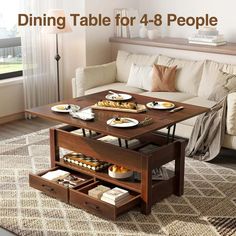 a living room table with plates and cups on it in front of a couch that has the words dining table for 4 - 8 people