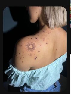 the back of a woman's shoulder with small stars on her upper arm and bottom