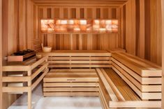 a wooden sauna with benches and shelves