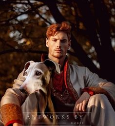 a man sitting next to a dog in front of a tree