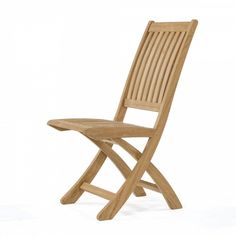 a wooden chair sitting on top of a white floor