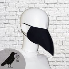 Black bird beak mask is made from two layers of 100% cotton fabric with elastic straps for behind the ears. Elastic straps include silicone adjusters for perfecting your fit. Removable nose wire included. (Note: no filter pocket.) Black elastic straps. Outer fabric is solid black. Inner fabric may vary. Mask is lightweight and washable. Tip of mask measures approximately 4 inches from face when worn. Inside is open with no filling to impede your breathing. Since the mask is completely open insid Bird Beak Mask, Beak Mask, Bird Mask, Plague Mask, Bird Beaks, Bird Masks, Plague Doctor, Costume Mask, No Filter