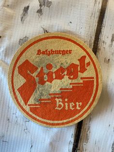 a red and white sticker with the words summer beer on it