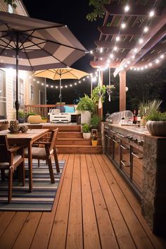 an outdoor deck with lights and patio furniture