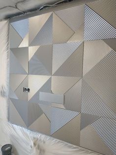 a wall that has some kind of metal design on it