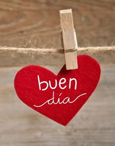 a red heart hanging from a rope with the word been disa written on it