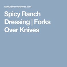 the words spicy ranch dressing forks over knives are in white letters on a blue background