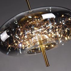 a light fixture with many lights on it