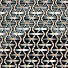 an image of metal mesh that looks like it is made out of steel wire and has wavy