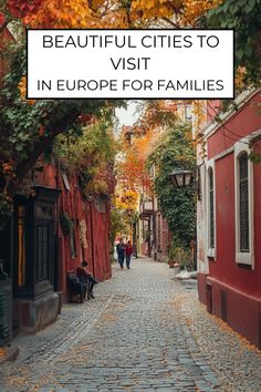 a cobblestone street with the words beautiful cities to visit in europe for families