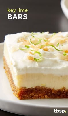 a close up of a piece of cake on a plate with the words key lime bars