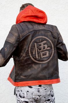 Shop Now With Free Shipping High Quality Leather Jackets Coats And Costumes In Low Price. Check item description on website. Goku Jacket, Mens Brown Leather Jacket, Leather Jacket Hoodie, Ball Character, Brown Leather Jacket Men, Leather Jackets Online, Brown Faux Leather Jacket, Red Orange Color, Leather Jacket With Hood